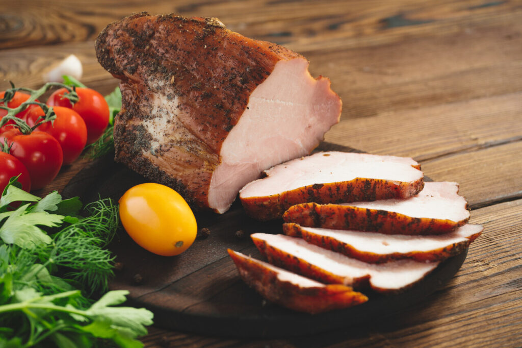 Sliced Cajun-rubbed turkey showing the seasoning crust.