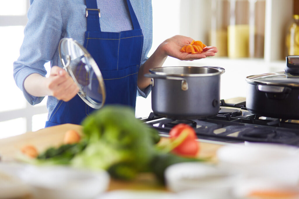 Woman cooking dinner