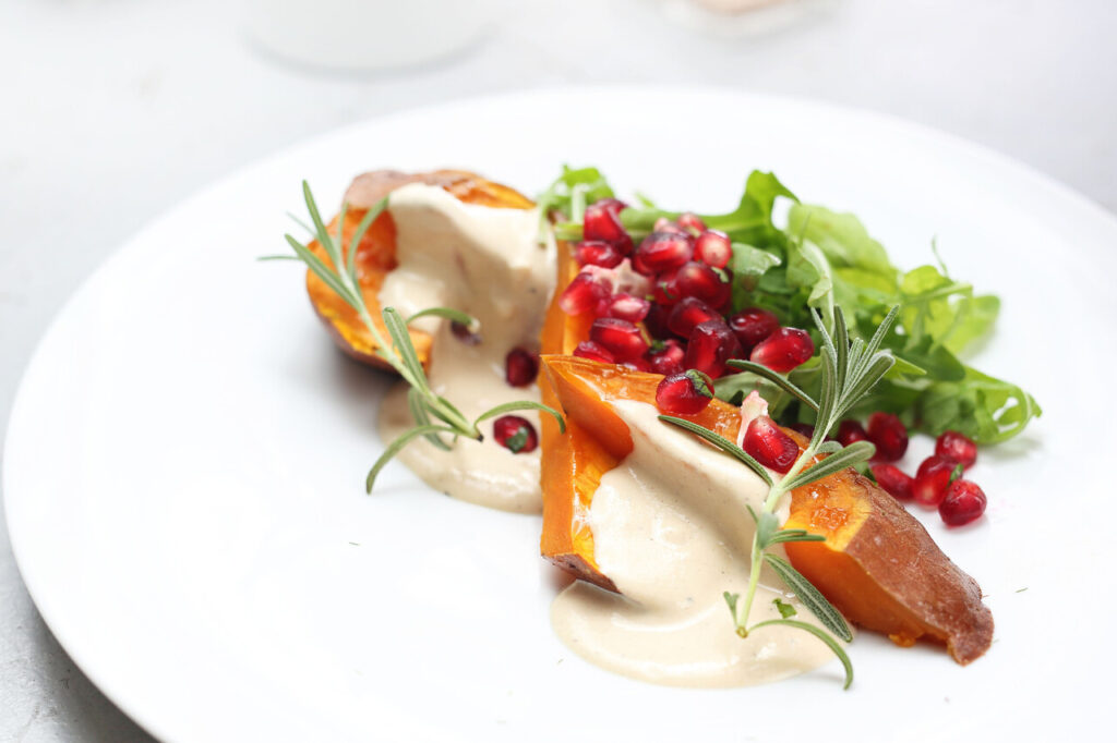 Roasted Sweet Potatoes with Tahini and Pomegranate