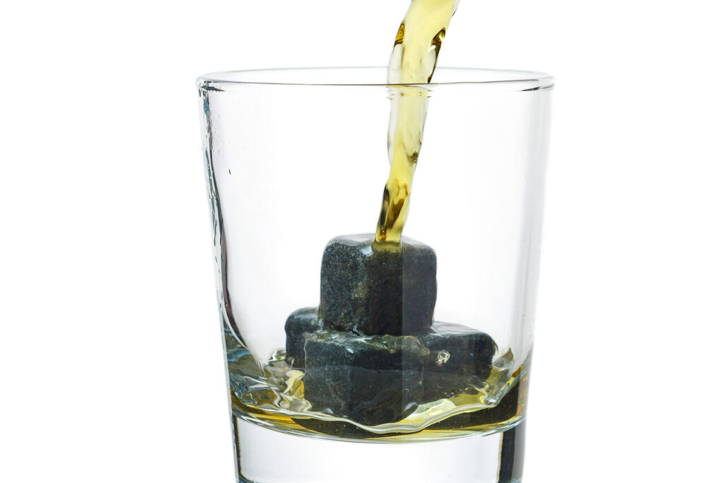 a close-up of stones in a glass