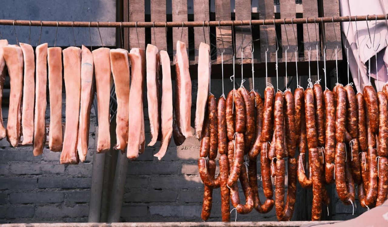 Curing meat hanging on a bar