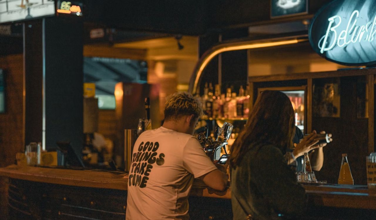 Man and woman at a bar