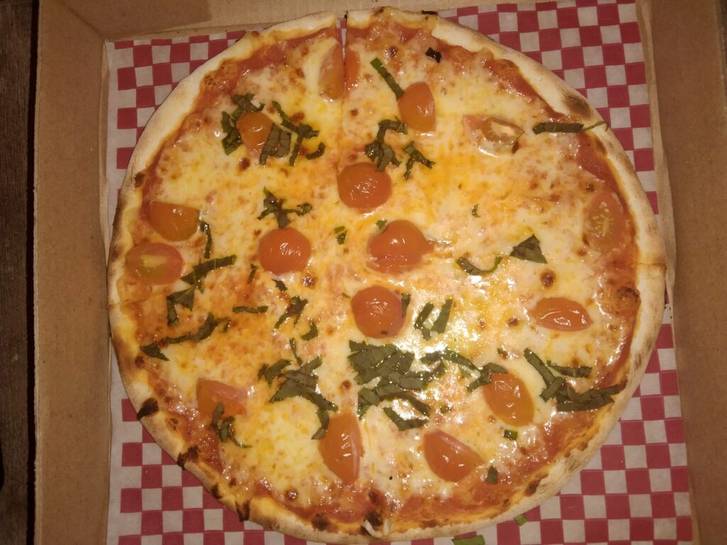 Pizza Margherita with extra mozzarella