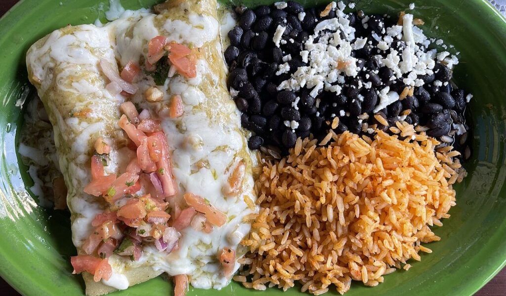Shrimp enchilada with rice and beans