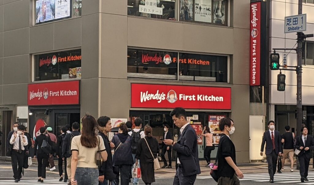 A crowded Wendy’s drive-through line during peak hours,