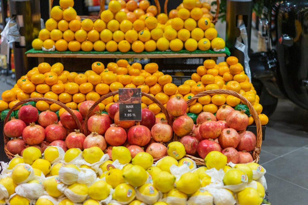 Fresh fruits arranged in baskets at a store