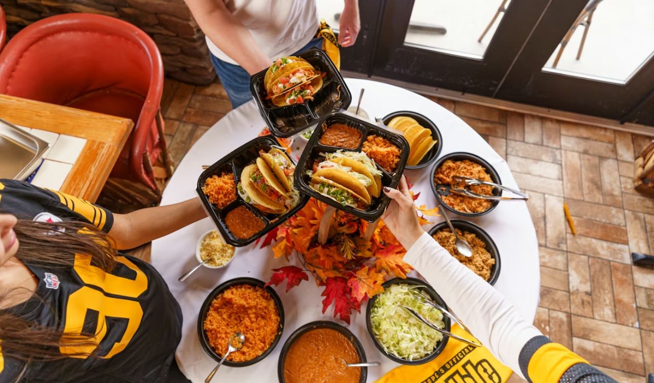 Friends eating Mexican food