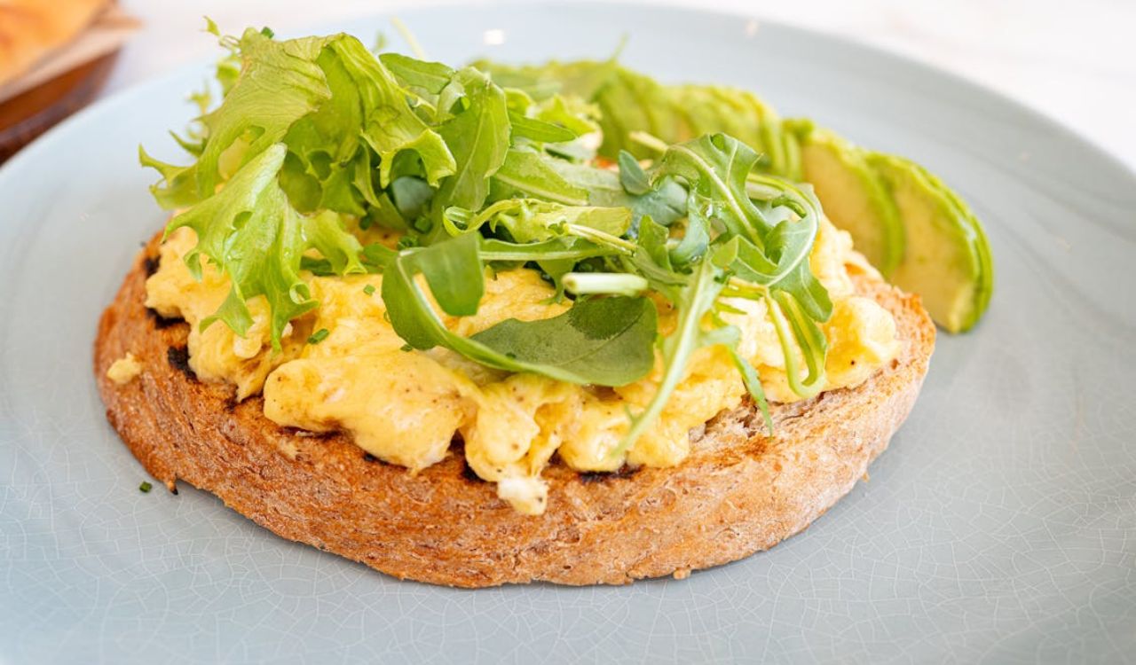 Scrambled Eggs and Avocado on Toast with Greens