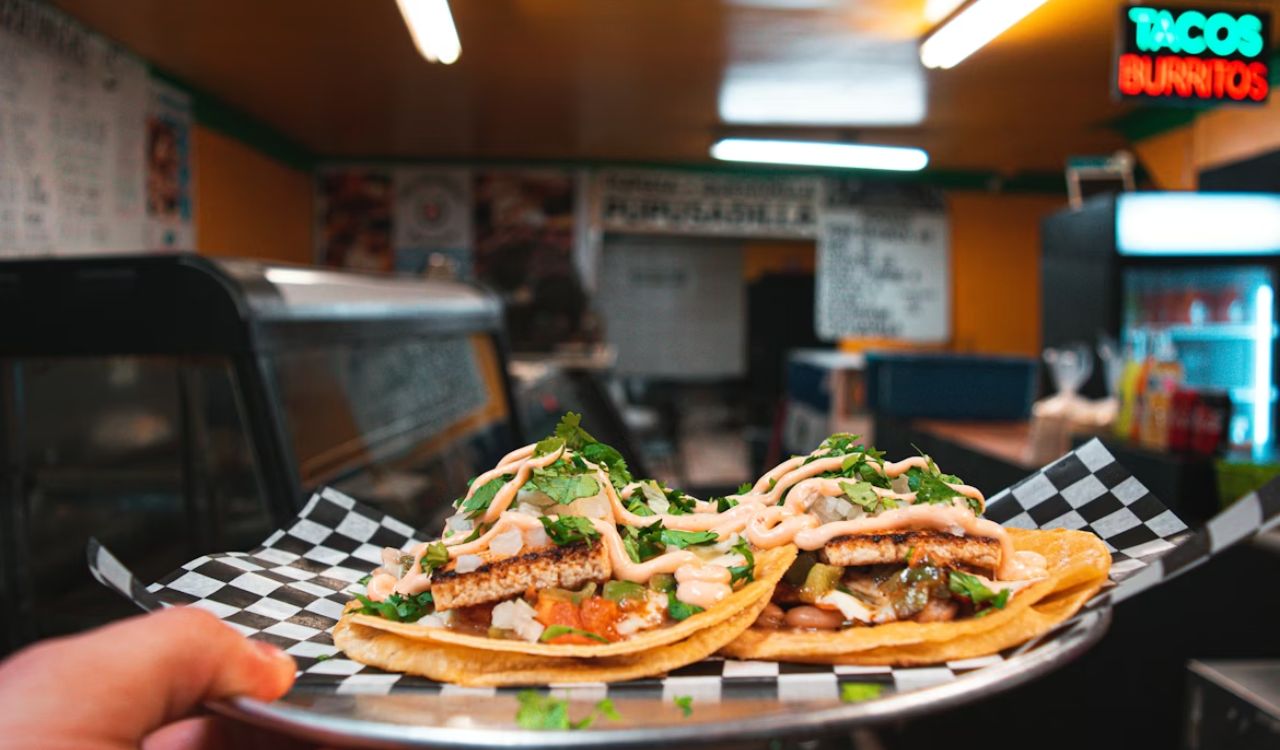 Serving tacos in restaurant