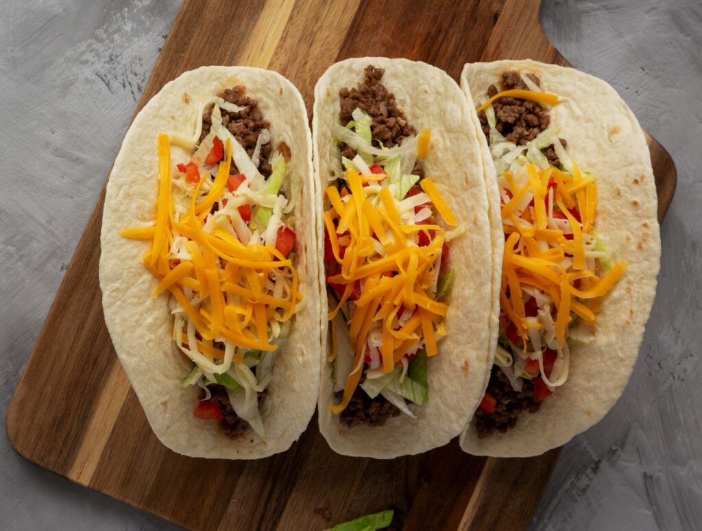 Loaded Steak Tacos with Shredded Yellow Cheese